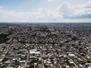 Expansive aerial view of São José Operário, showcasing dense urban architecture in Manaus, Brazil.