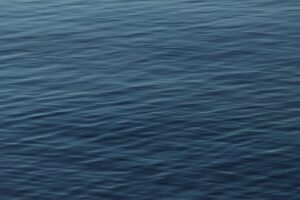 Calm and rippled water surface in Jönköping, highlighting serene nature.