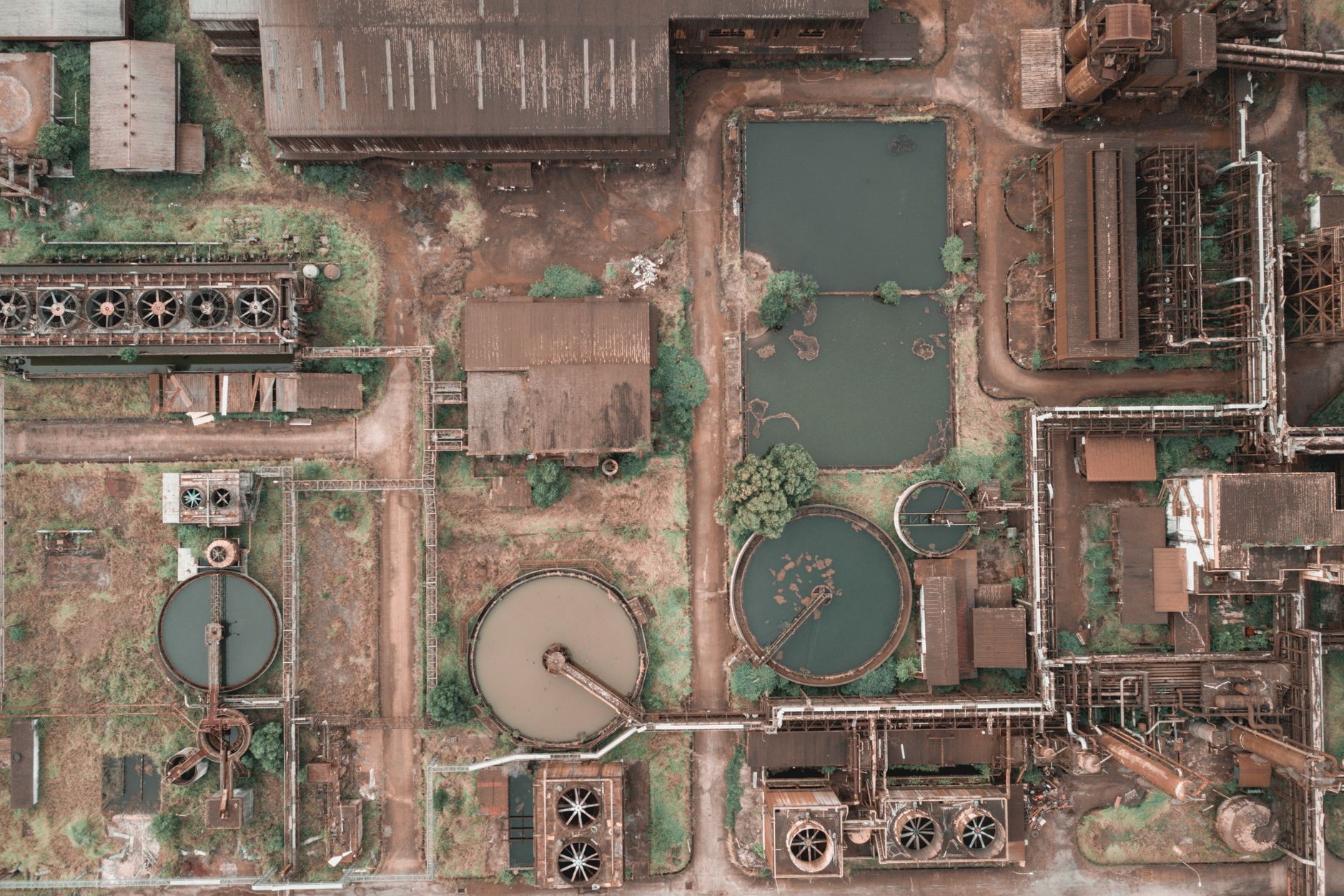 Aerial view of wastewater treatment plant with round tanks for recycle dirty sewage water